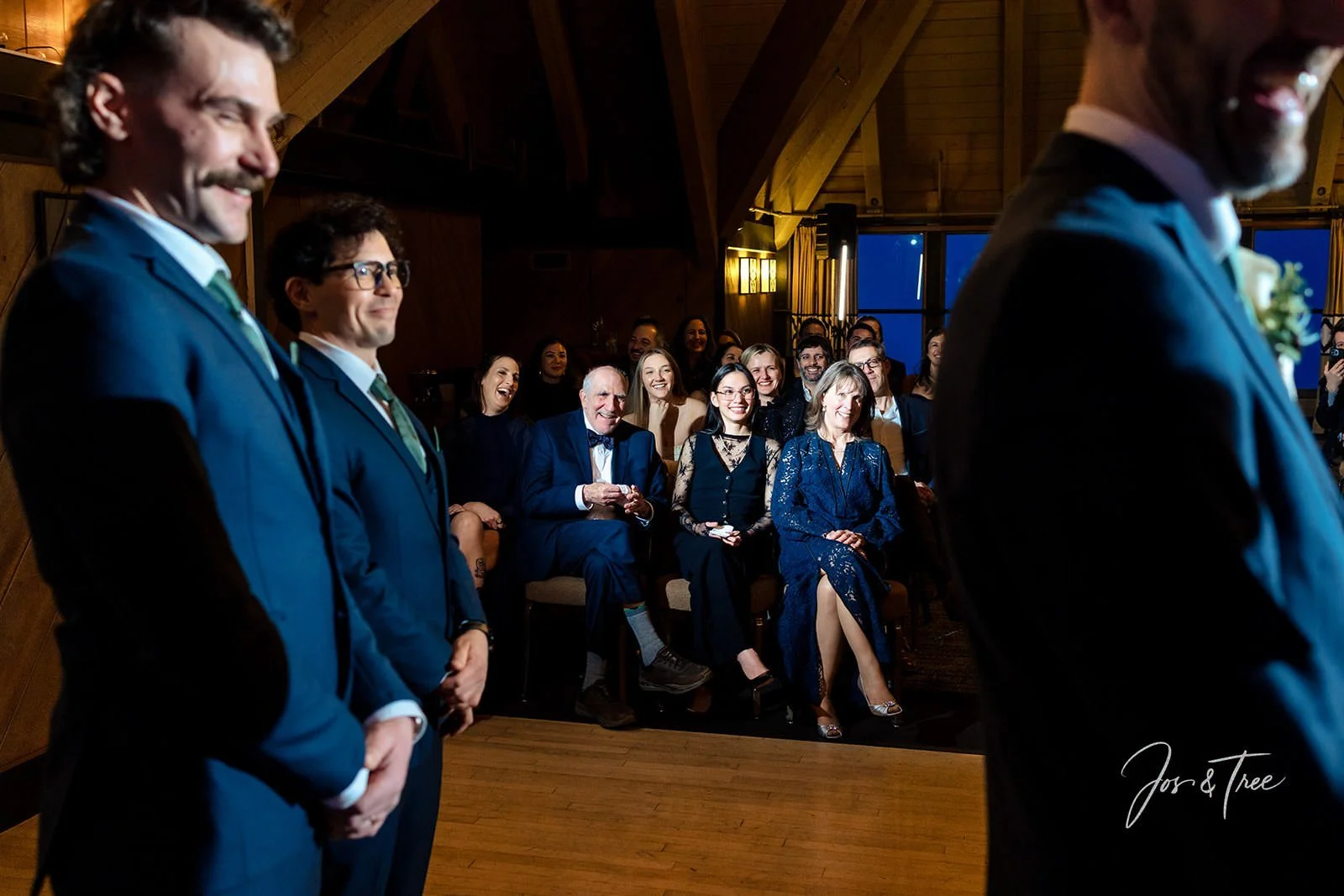 groomsmen-smiling-watching-ceremony.jpg