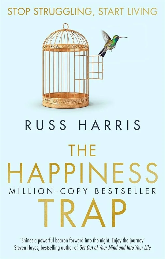 Book cover of the Happiness Trap