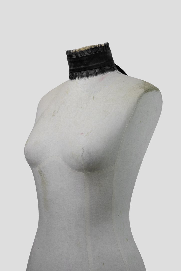 Image of the Ruffled Choker, a luxurious neckpiece made from 100% silk crepe de chine