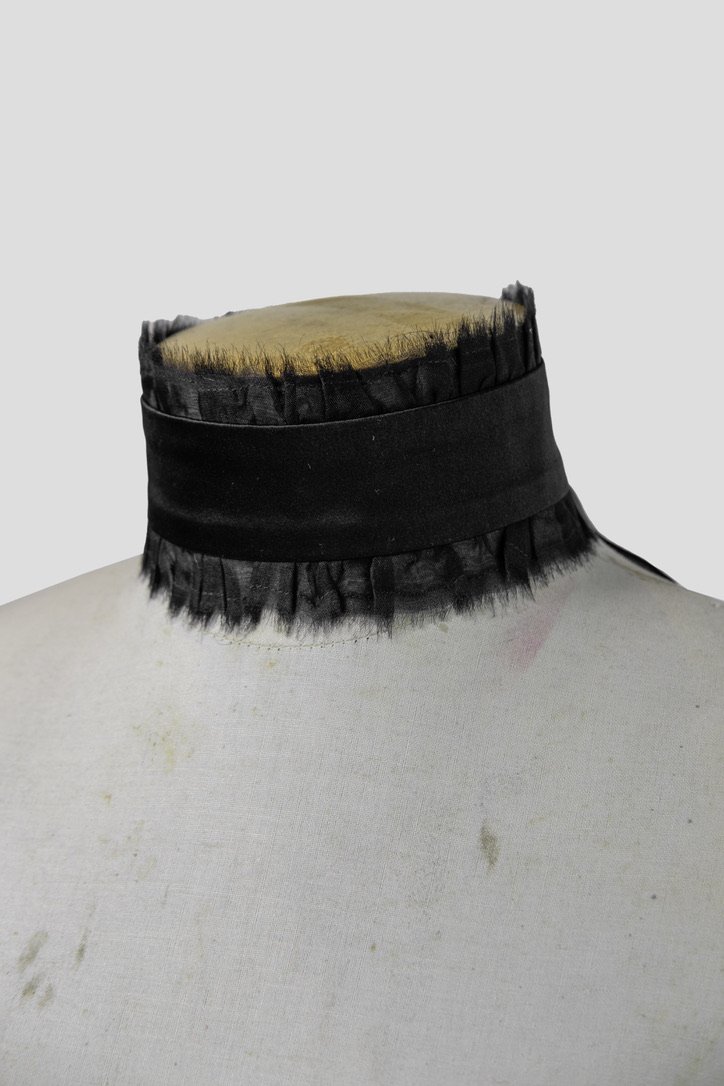 Image of the Ruffled Choker, a luxurious neckpiece made from 100% silk crepe de chine