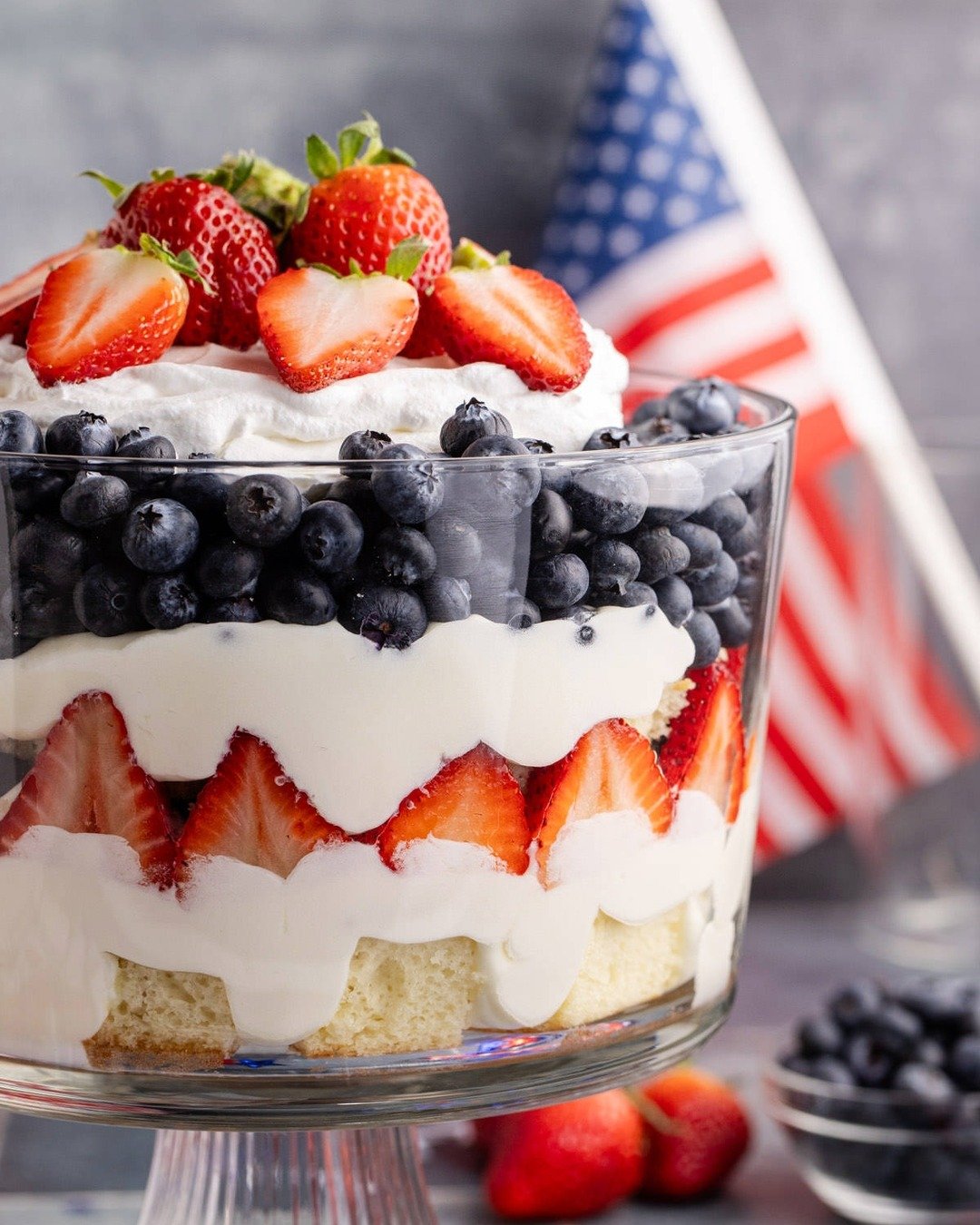 Our Red, White, and Blue Trifle is a festive favorite for patriotic holidays and summer gatherings alike. Layers of soft vanilla cake, creamy pudding, and fresh berries make for a light, refreshing dessert that&rsquo;s as beautiful as it is delicious