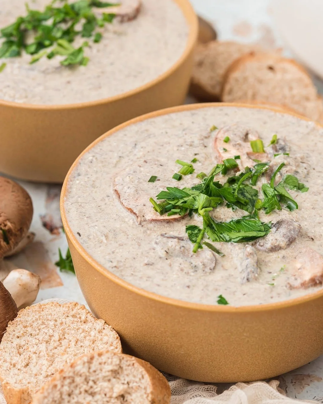 Warm up with our creamy mushroom soup, made with Greek yogurt instead of cream for a lighter twist. Full of earthy, savory flavors, it&rsquo;s a great cozy fall soup recipe for chilly nights. Perfect as a Thanksgiving starter, a side dish, or an easy
