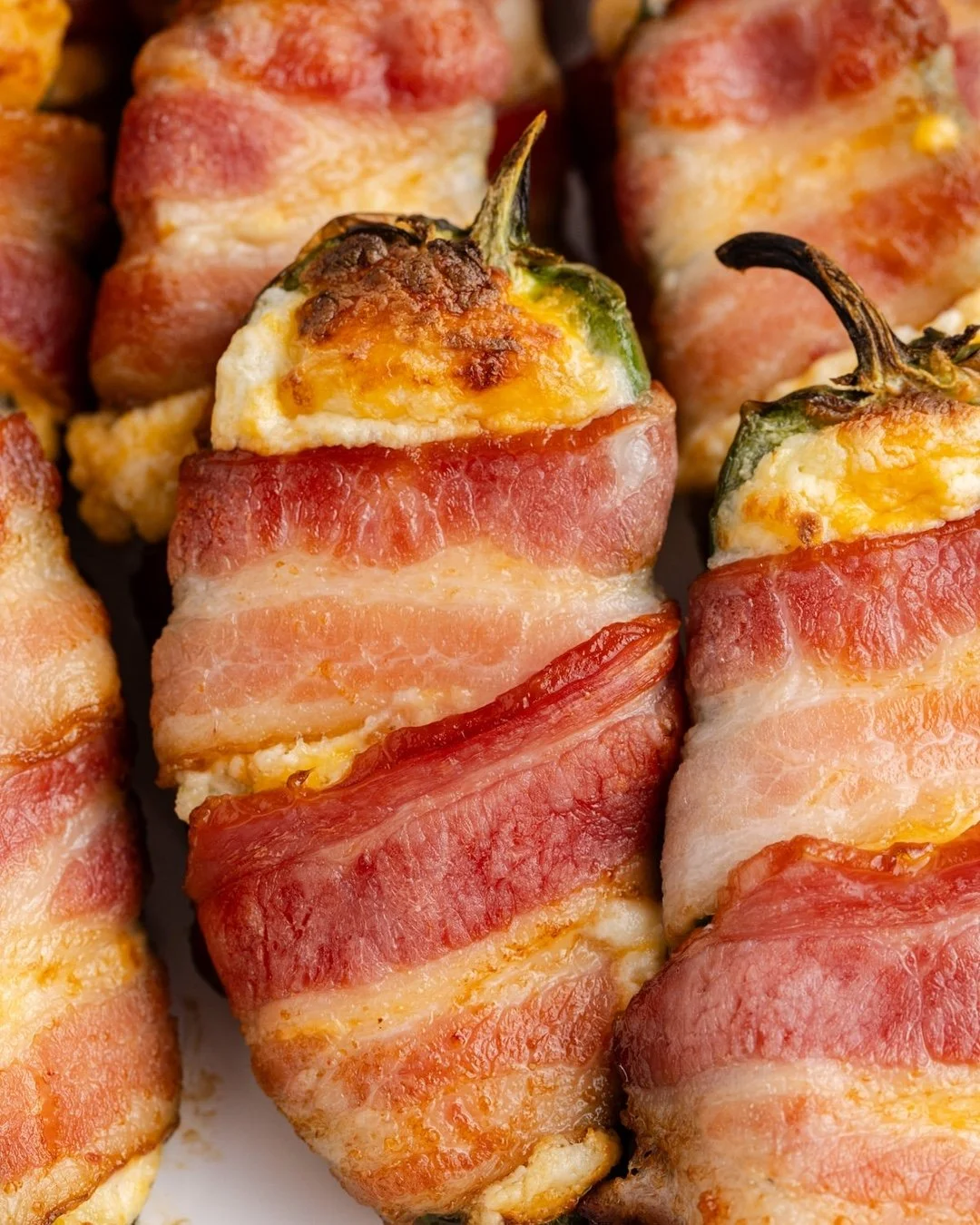 Spicy, cheesy, and crisped to perfection in the air fryer, our bacon wrapped jalape&ntilde;o poppers are the perfect addition to your game day snack spread. Our best tip: make a double batch, because they disappear fast! 

Comment 'recipe' and we'll 