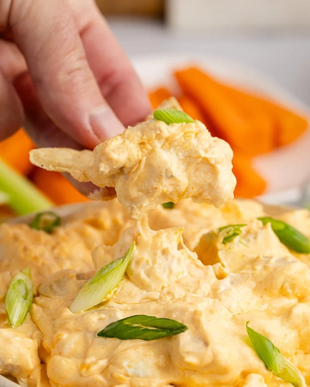Is a game day spread even complete without buffalo chicken dip? Ours is creamy, cheesy, and loaded with bold and spicy buffalo flavor, aka the ultimate game day appetizer for your football party! Made in the slow cooker, it&rsquo;s a true set-it-and-