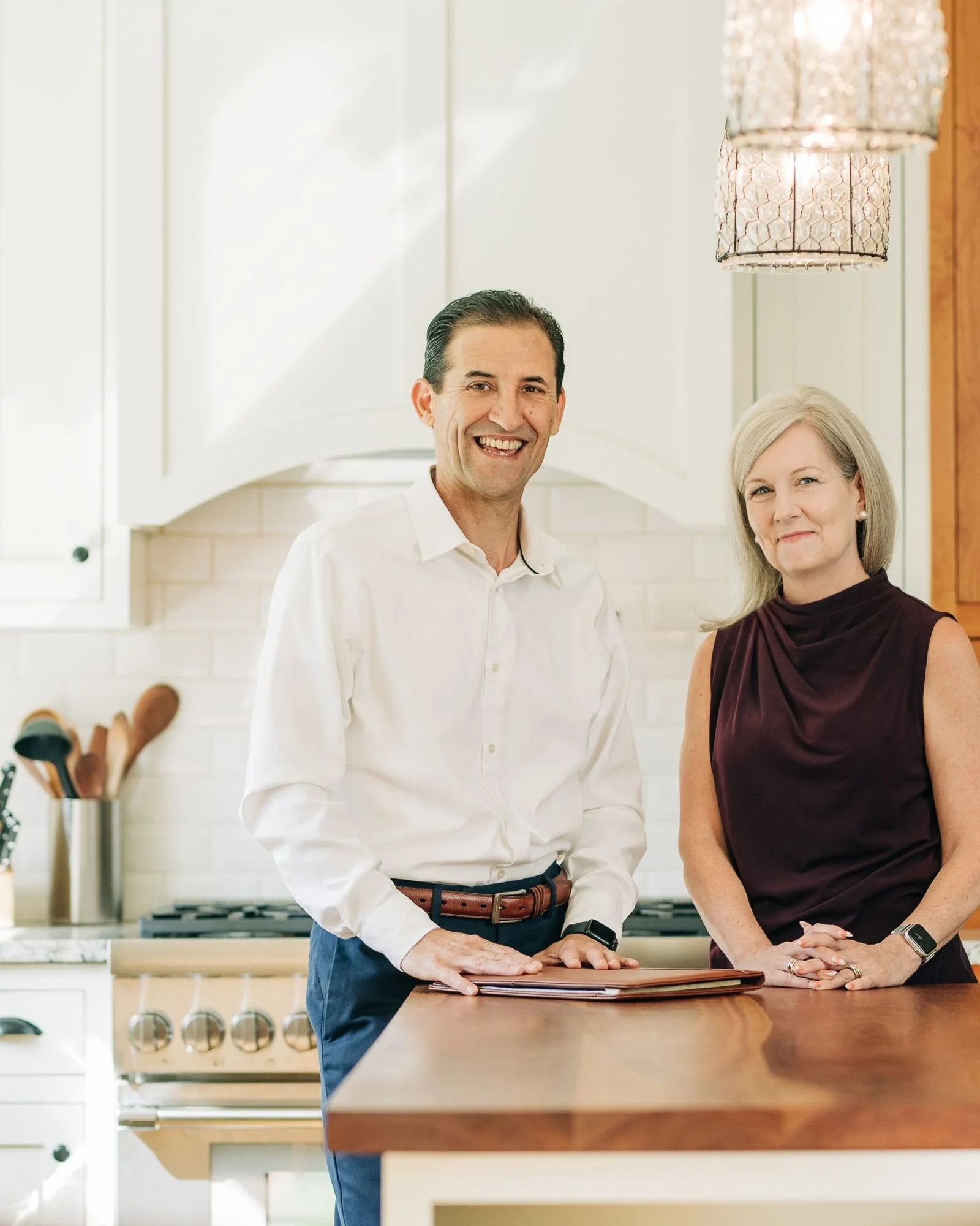 Kate and Jonas Werner of Balsam Realty in a Freeport kitchen