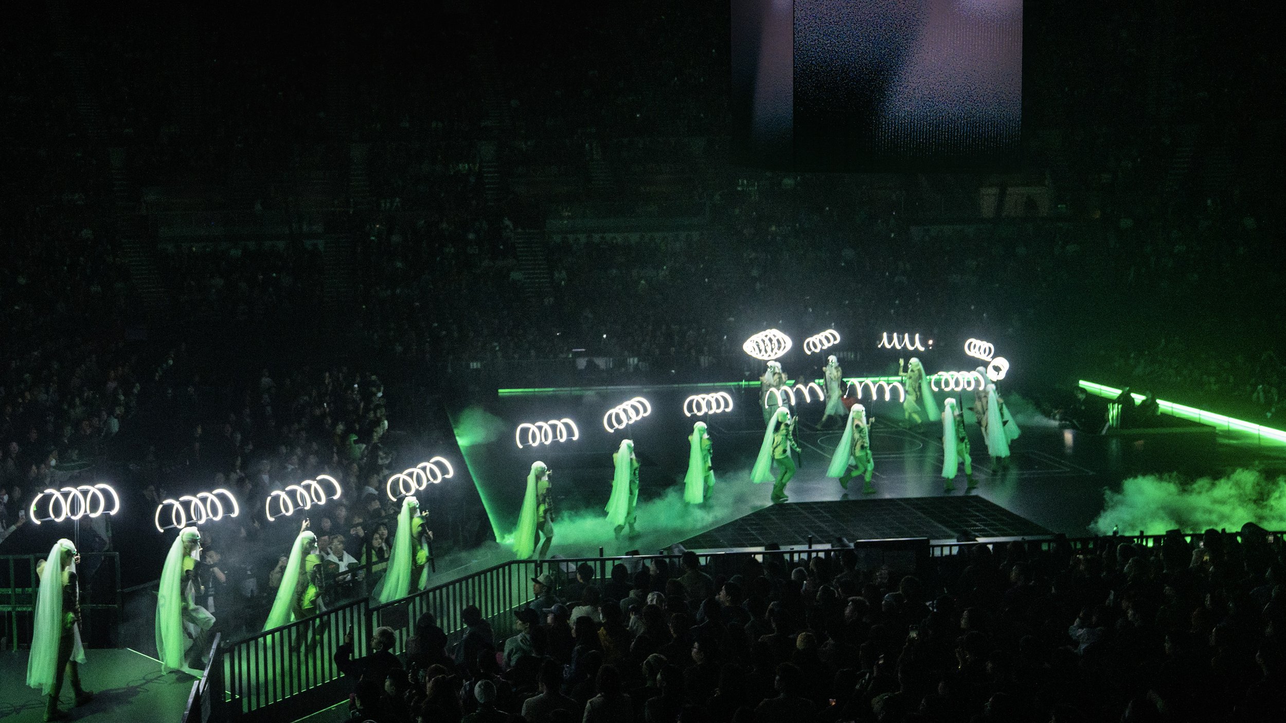 Jace Chan performing in Jace World concert with immersive Green Snake puppet. pop concert stage design by London set designer Ruby Law.