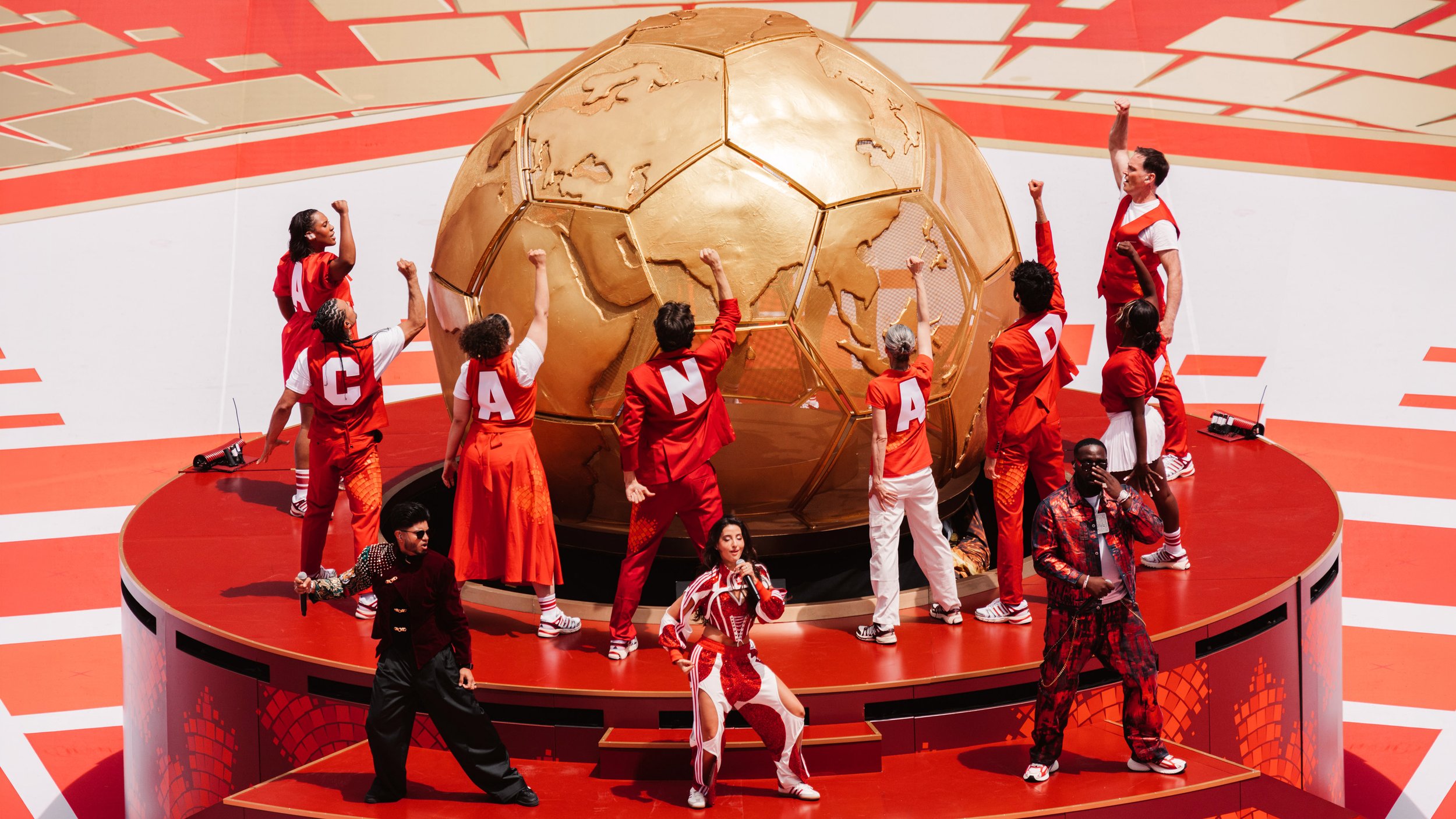 The completed golden globe sculpture unveiled during the FIFA World Cup 2026 Toronto Opening Ceremony.