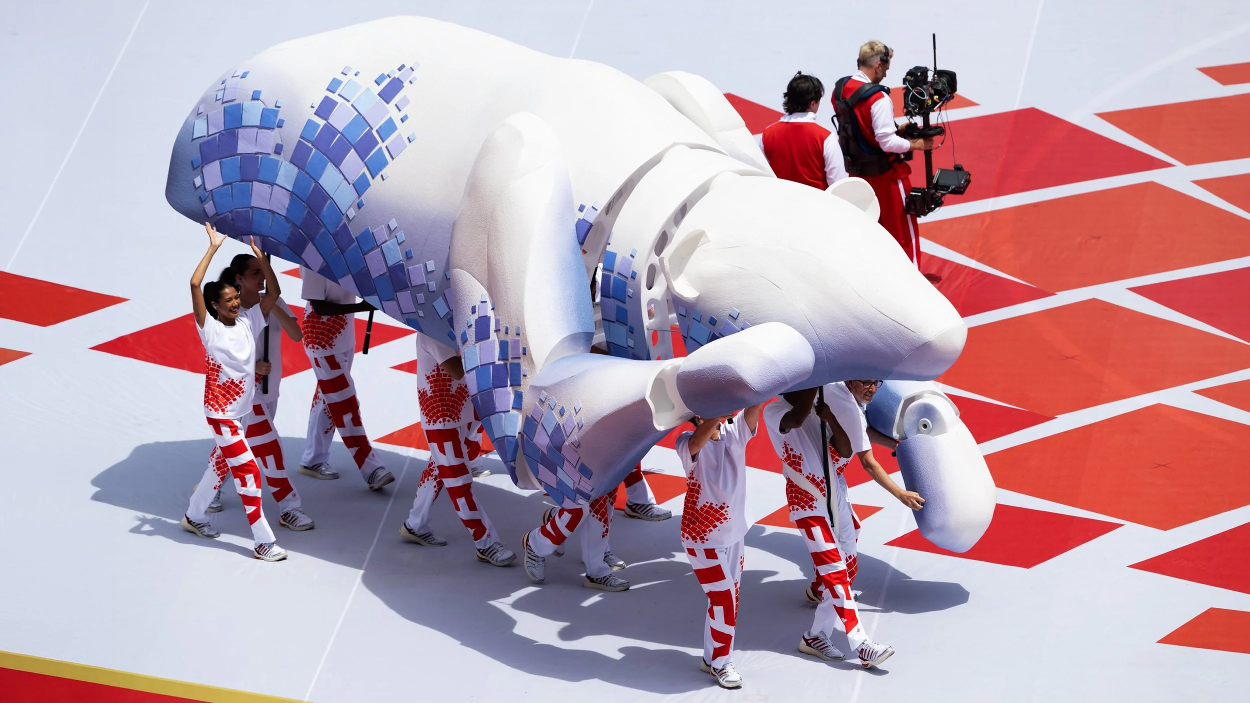 Close-up of the giant polar bear puppet with mosaic graphics created for the FIFA World Cup 2026 Toronto Opening Ceremony by Production Designer Ruby Law