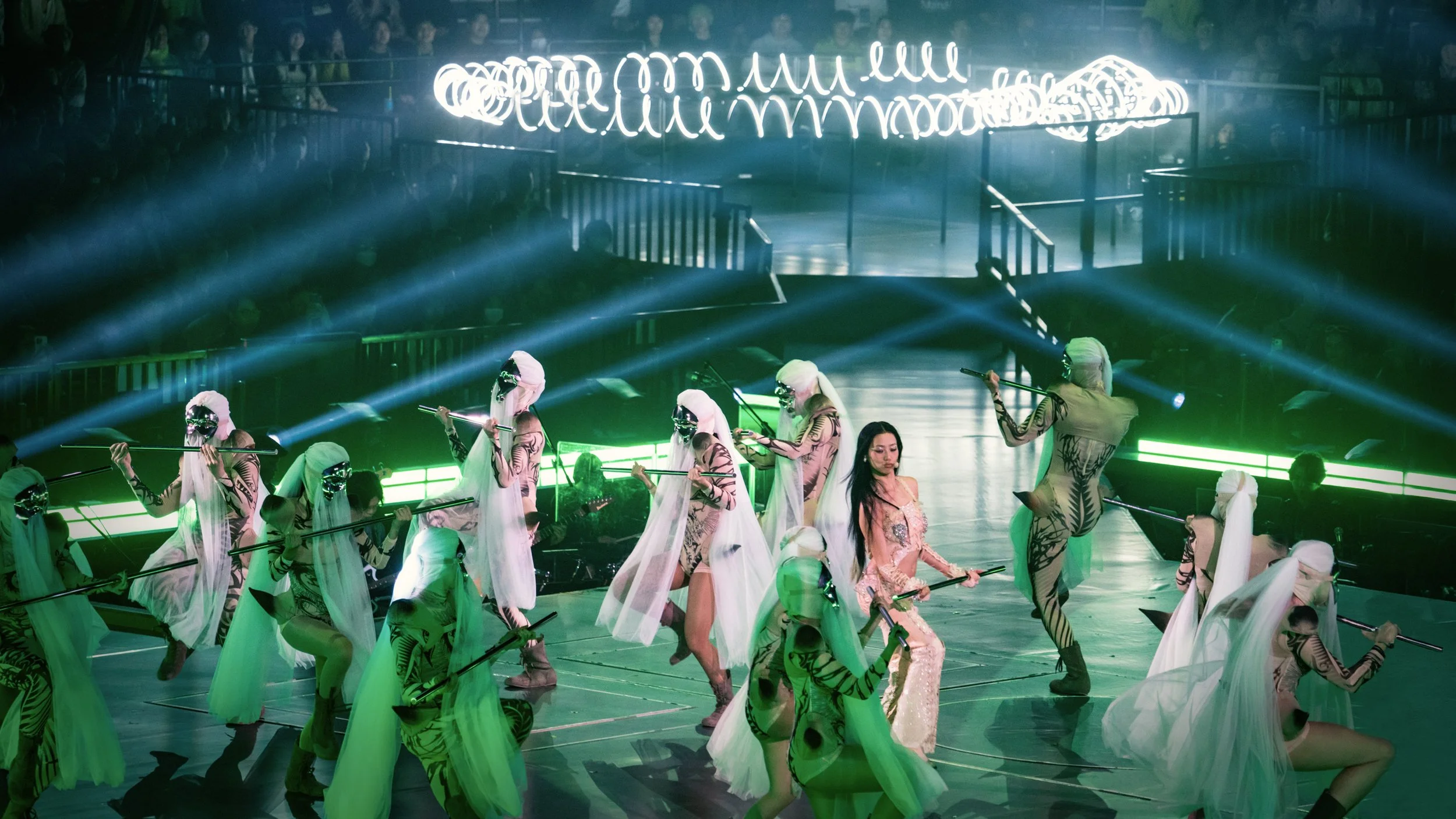 Jace World concert stage with modular illuminated snake puppet creating shifting environments, pop music set designer Ruby Law, London set designer.