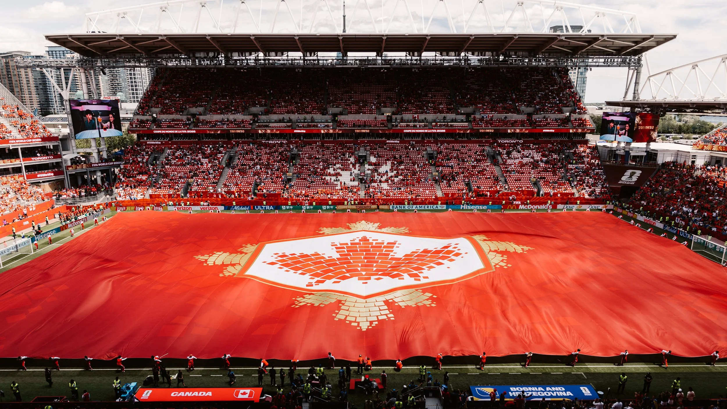The giant maple leaf field cloth fully unveiled during the FIFA World Cup 2026 Toronto Opening Ceremony designed by Production Designer Ruby Law.