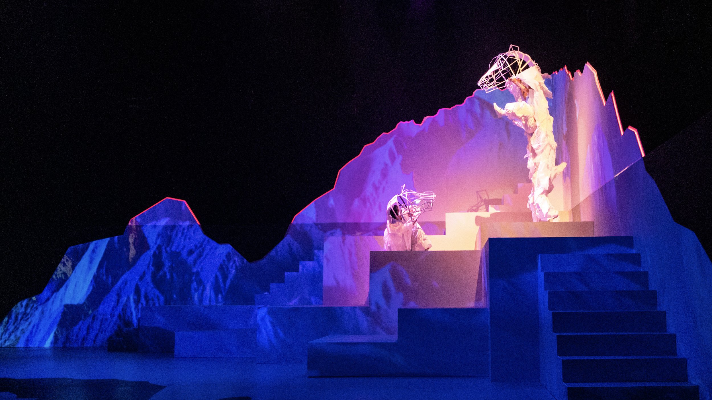 Ensemble performance with large-scale leopard puppets on immersive mountain stage, Ruby Law RULA London