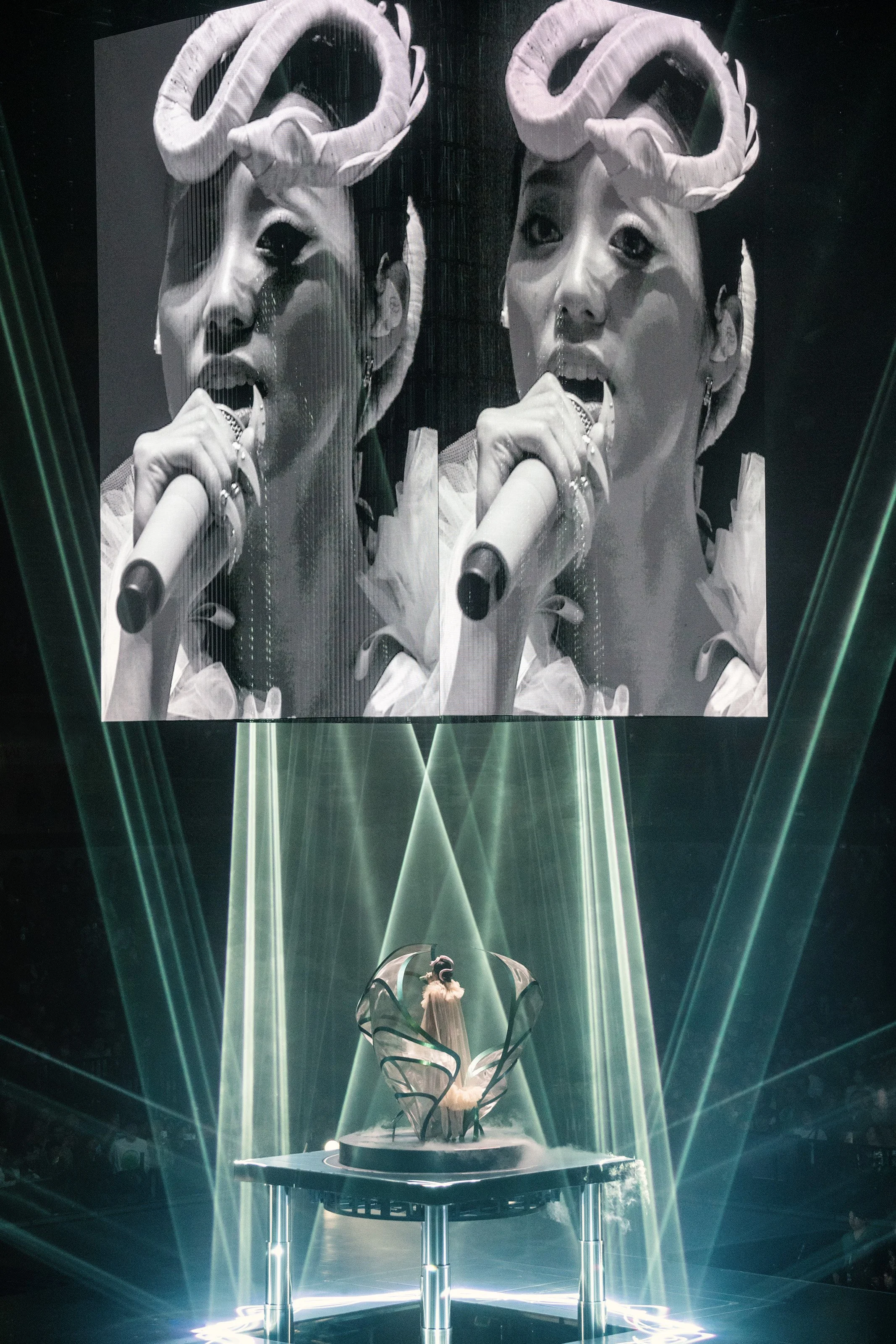 Sculptural abstract cocoon structure opening as a portal behind Jace Chan in Jace World, pop music set designer Ruby Law, London set designer.