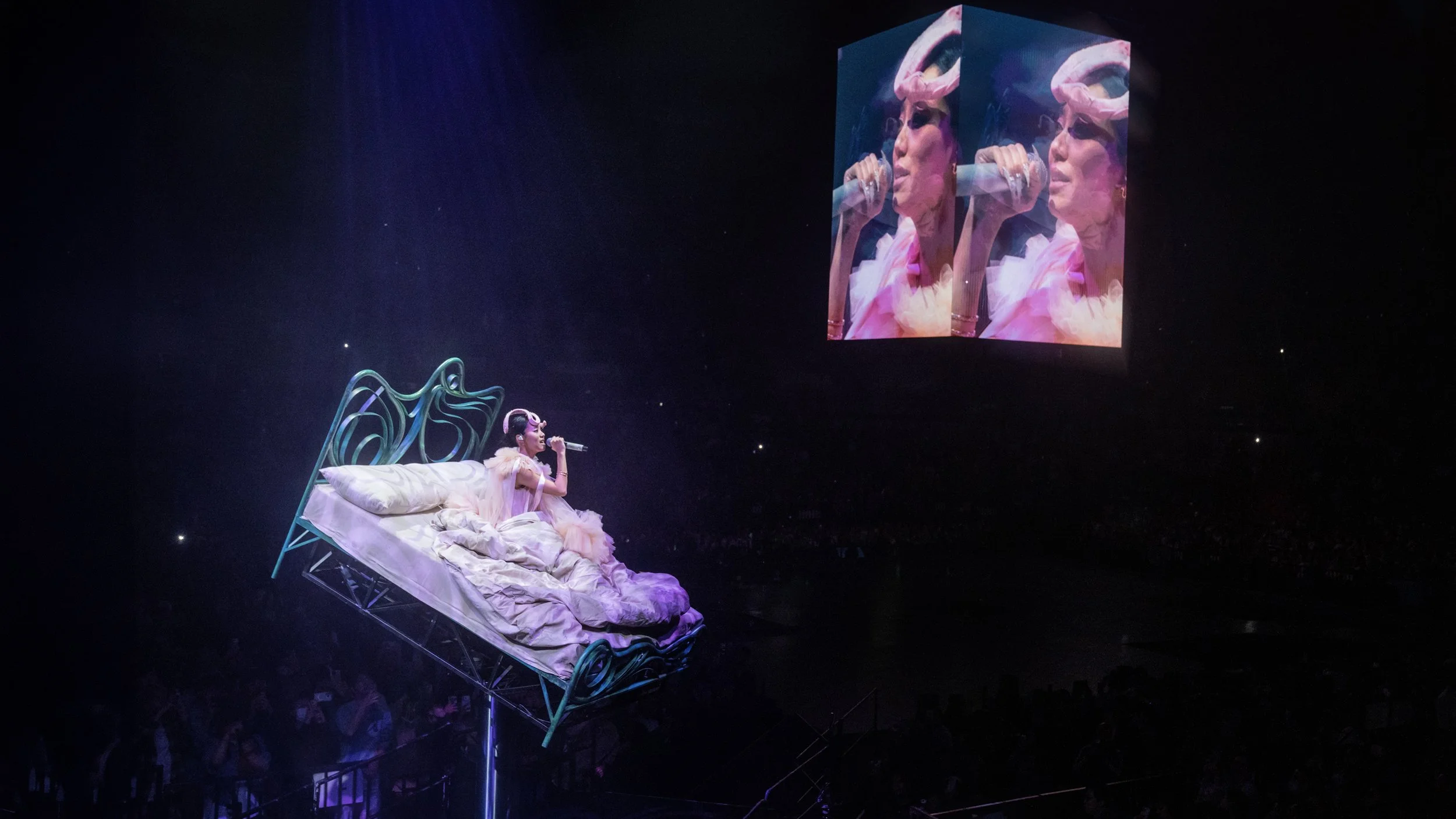 Jace World concert featuring dreamlike bed installation symbolising emotional landscapes, pop concert stage design by London set designer Ruby Law.