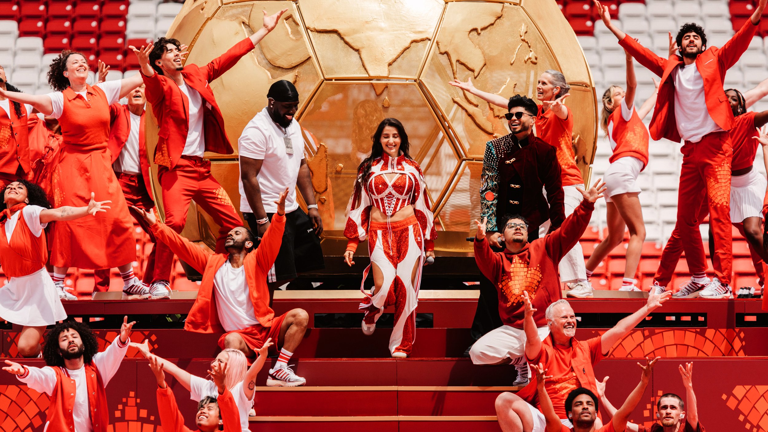 Musical performances surrounding the completed golden globe during the FIFA World Cup 2026 Toronto Opening Ceremony, designed by Ruby law