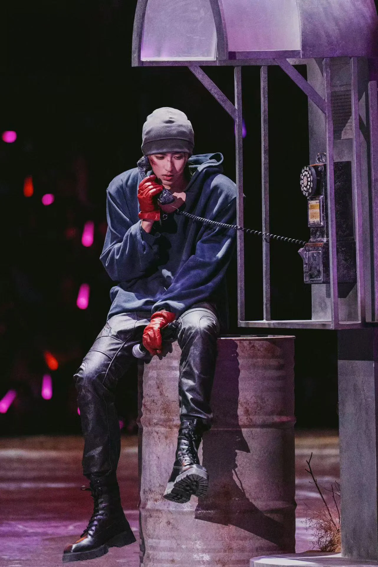 KUN 蔡徐坤 as the Deadman character at a roadside phone booth, scenic and stage design by Ruby Law, RULA