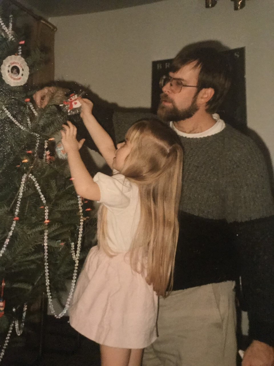 girl-dad-decorating-christmas-tree.jpg