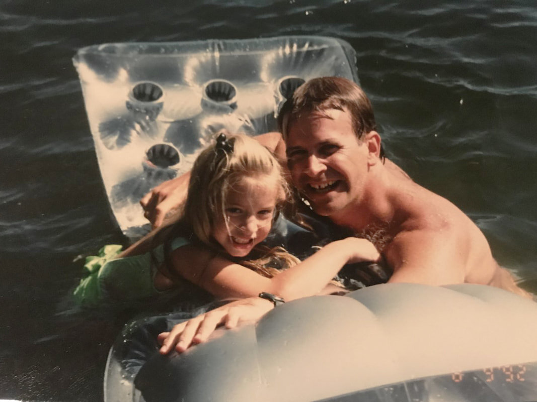 girl-dad-floating-lake.jpg