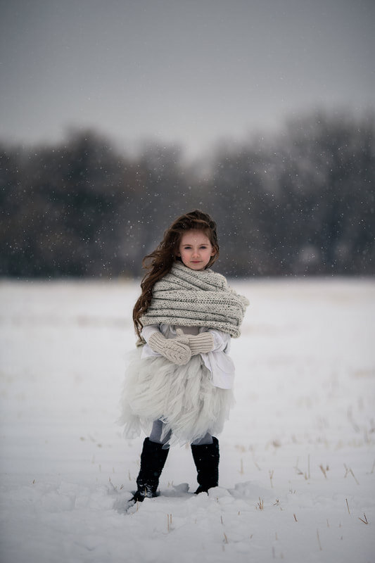 brown-haired-girl-snow.jpg