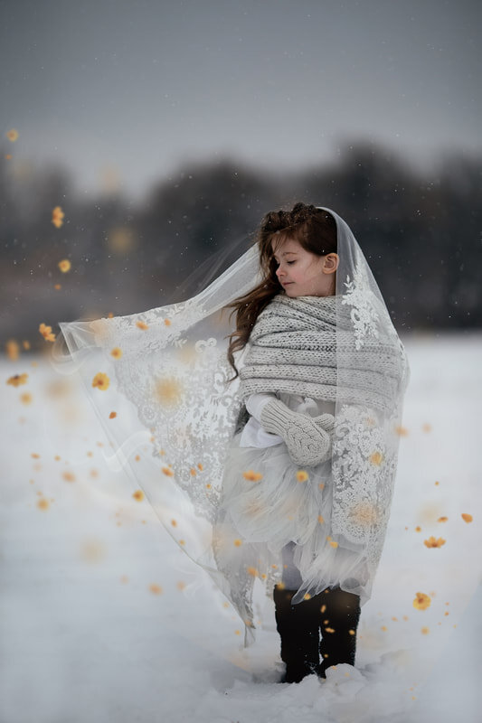 little-girl-lace-veil-snow.jpg