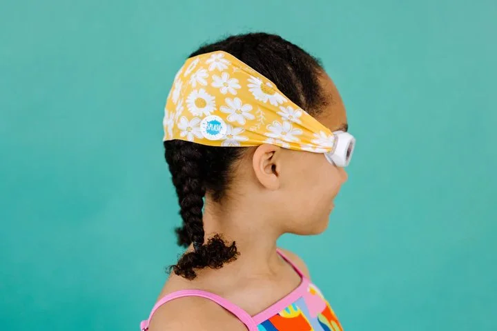 Swim goggles with a large soft comfort band- no more hair snags!