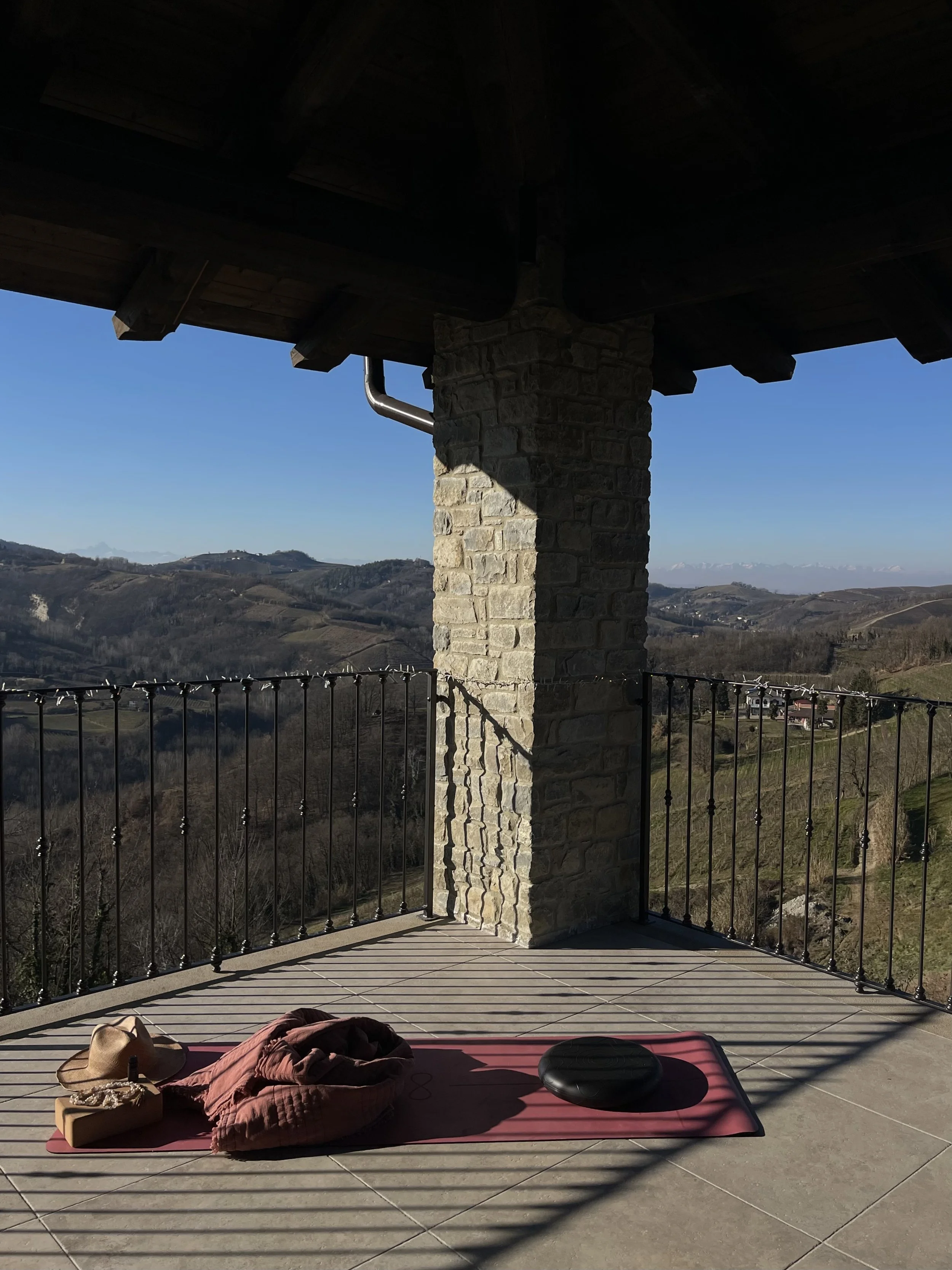 Yoga from the covered terrace with Alpview