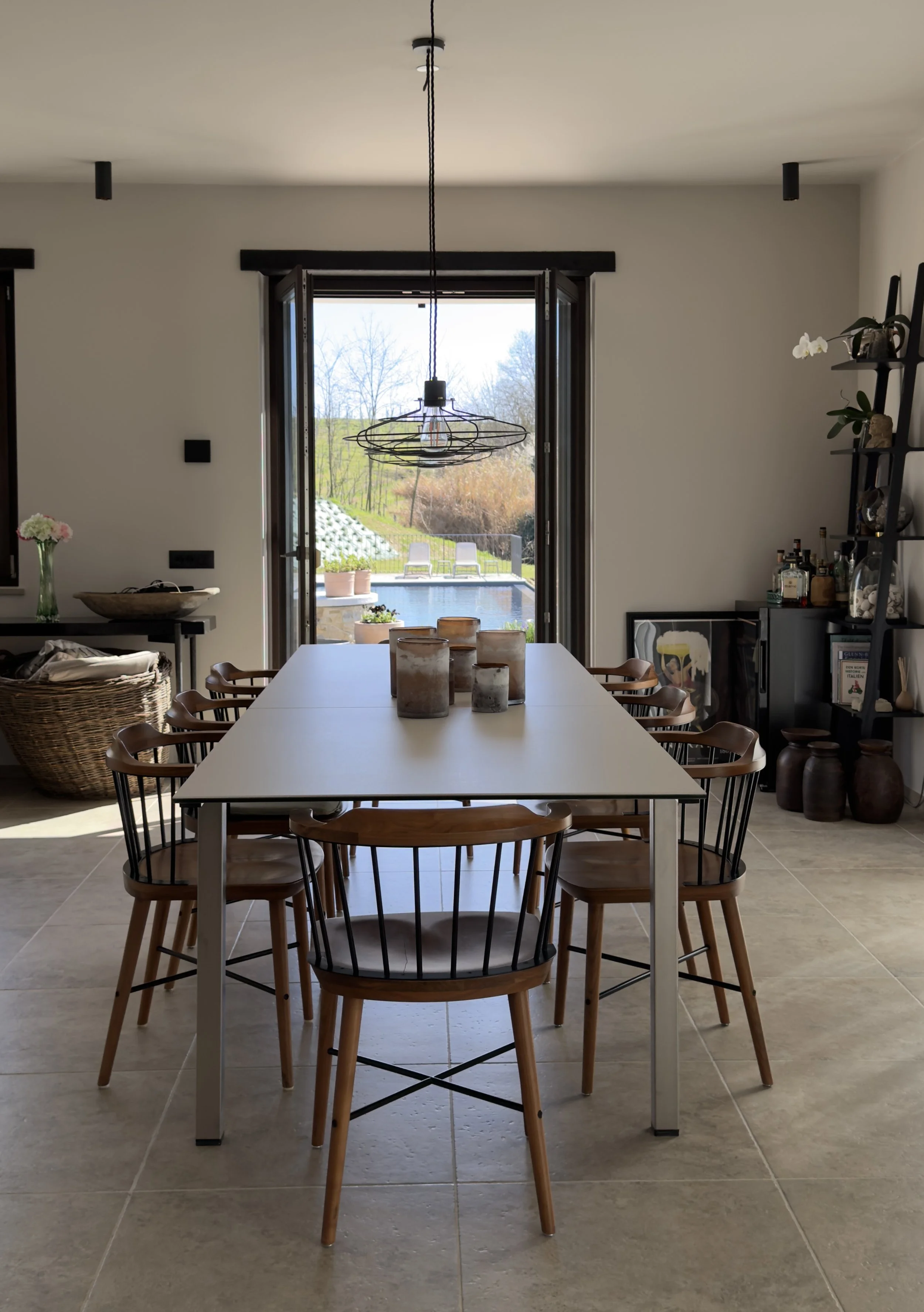 Dining area overlooking infinity pool.