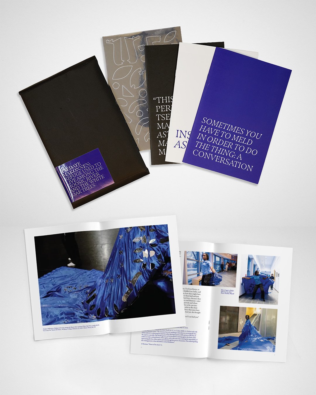 Three booklets, a mirror sticker sheet, and a black envelope with a label