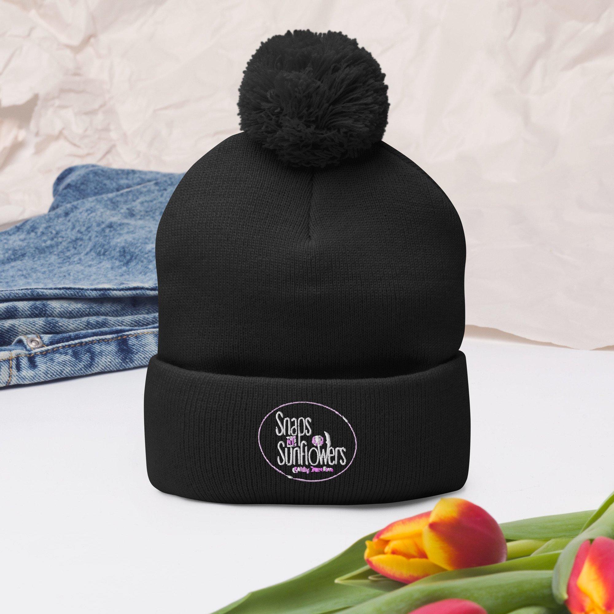 pom-pom-knit-cap-black-front-2-636abff18fecd.jpg