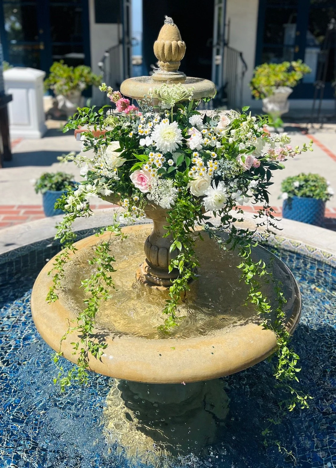 Fountain Flowers at La Venta Inn Palos Verdes Weddings.jpeg