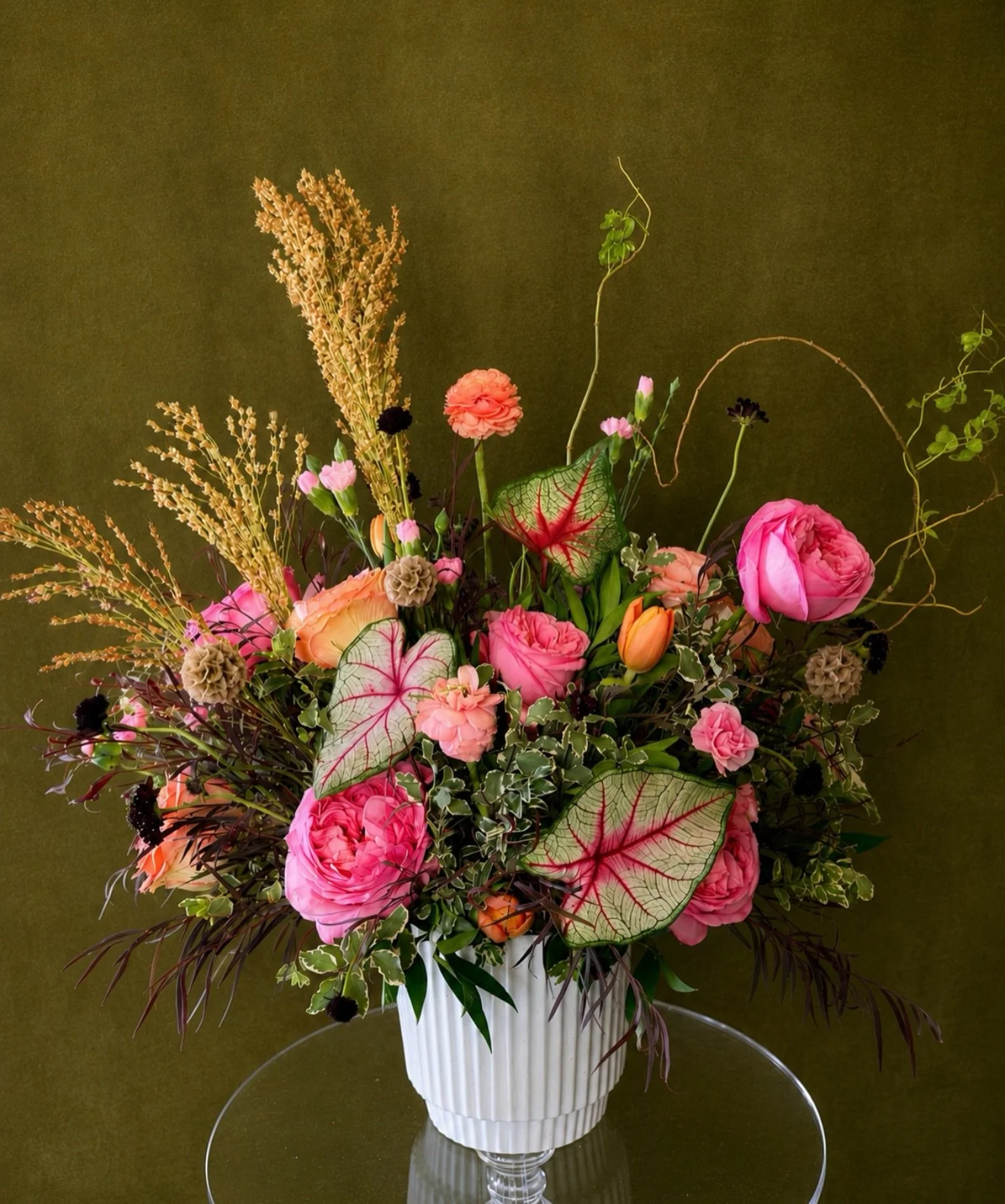 Late Summer lingers in the garden, but Autumn is beginning to whisper. 

Sun-warmed pinks, coral and pops of burgundy mingle with dried grasses, seed pods and the first deeper notes of the season ahead&mdash;a fleeting moment where Summer&rsquo;s abu