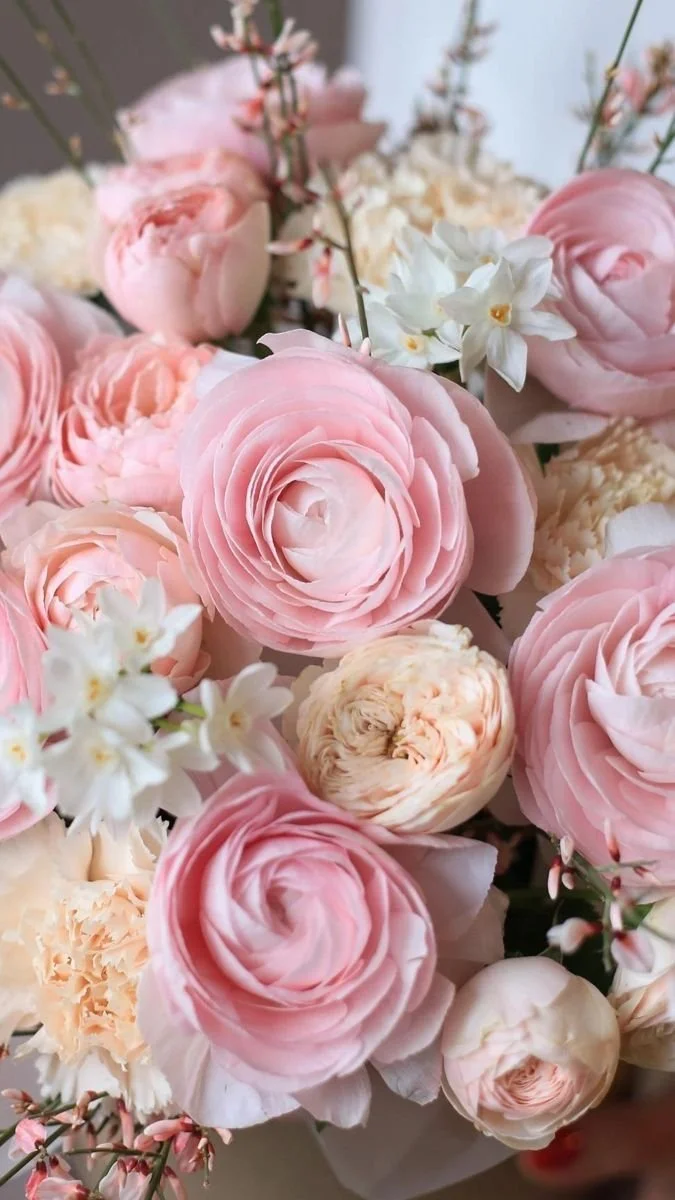 Close-up of fresh pink flowers with natural texture and soft romantic tones