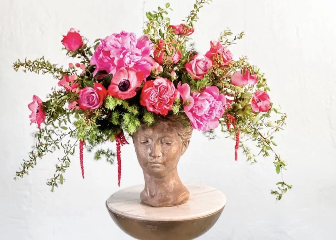 whimsical-pink-lady-bust-flower-arrangement-daphne.jpg