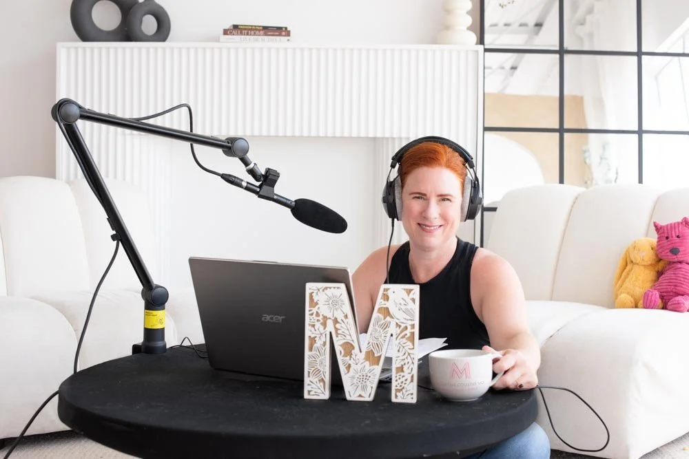 Healthcare professional Martha Cousins in podcast mode with colourful stuffed animals representing pediatric research
