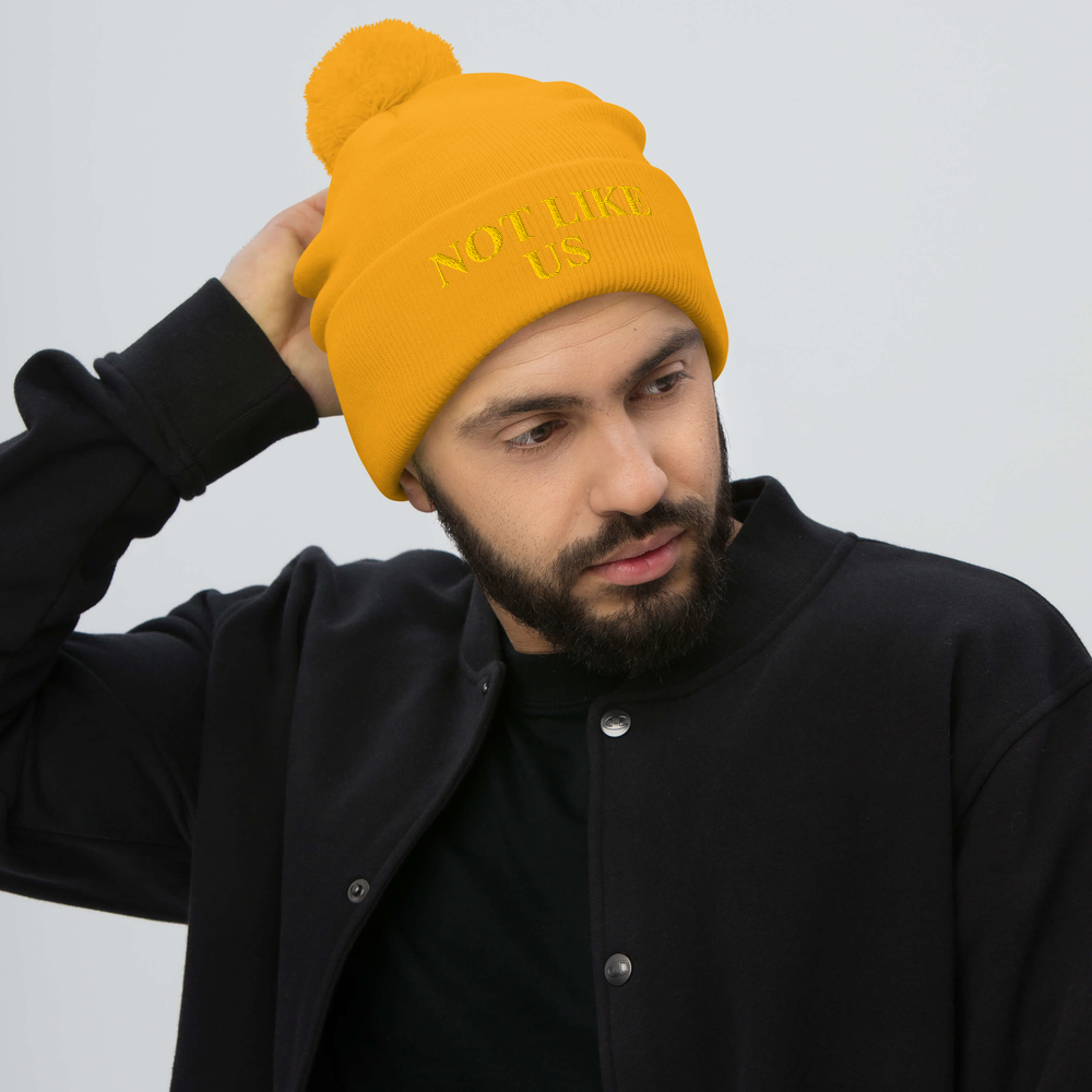 pom-pom-knit-cap-gold-front-679e09cab504a.png