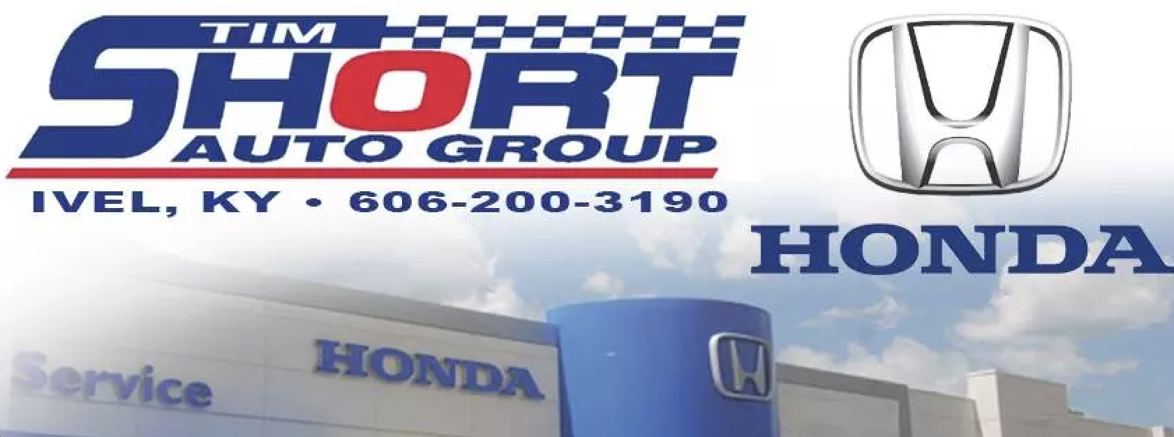 A car dealership sign for Short Auto Group in Ivel, Kentucky, featuring the Honda logo and building with Honda dealership branding.