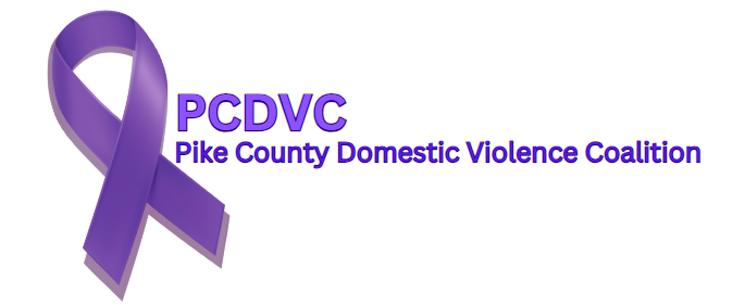 Purple awareness ribbon next to text reading 'PCDVC Pike County Domestic Violence Coalition'.