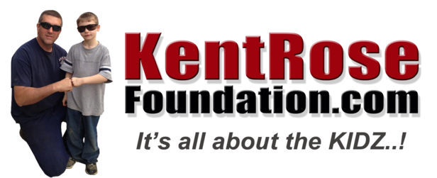 A man and a young boy shaking hands in front of a logo that says 'KentRose foundation.com' with a gray background.