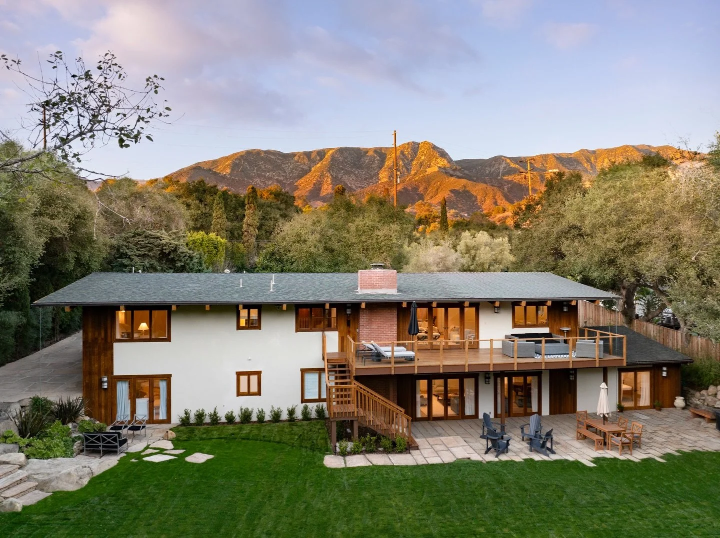 New Price &bull; 2815 E Valley Road &bull; Offered at $6,295,000

Set on a level, nearly 1-acre parcel, this remarkable property is a lush, modern compound. Nestled among live oaks, boulders, and verdant lawns, a 4,814&plusmn; square feet, 5 bedroom 