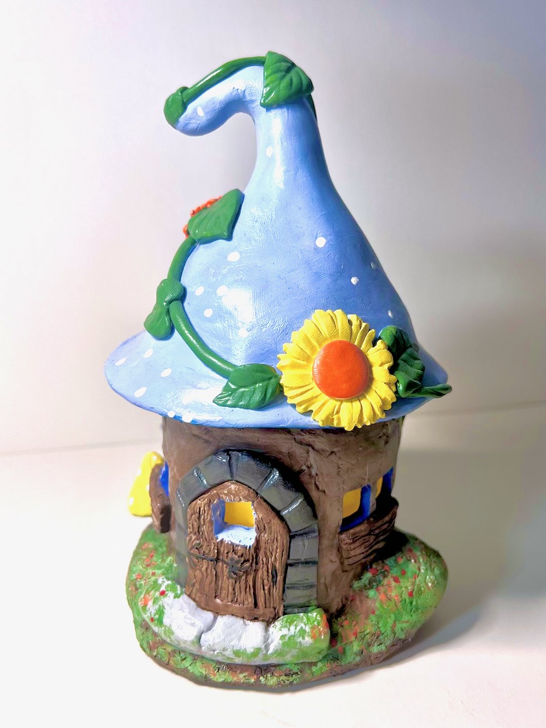 Blue Bonnet mushroom fairy cottage with orange & yellow flowers