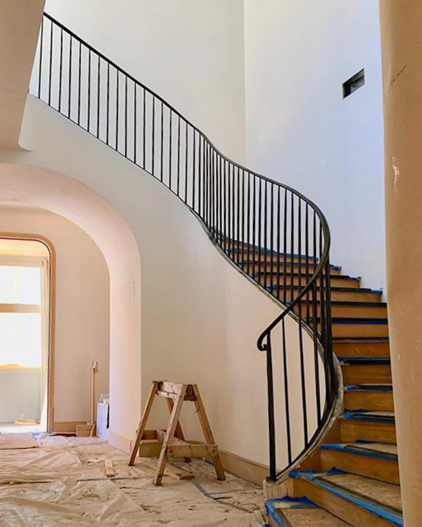 image of interior installation of railing made by smithworks iron and design