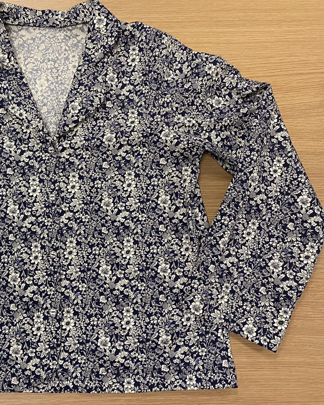 This is such a pretty make by Rosemary, a blouse made from navy floral print cotton. It has so many firsts for her, an a lot of consolidating her skills too. She has worked a collar, applied binding, put in button holes and sewn on buttons. A fabulou