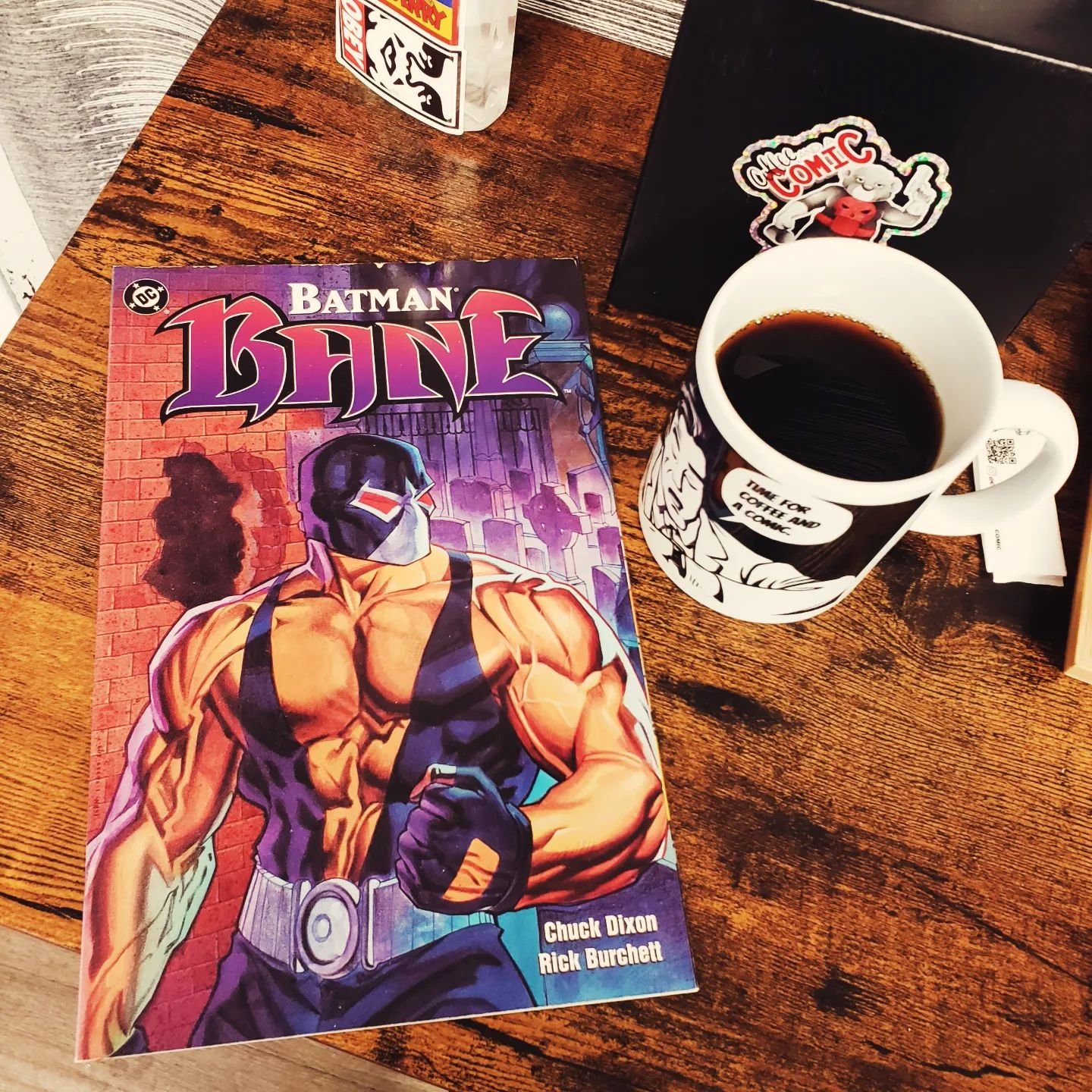 Today's Coffee ☕ and a Comic 📖 is Batman BANE, a prestige one-shot, Bane, the infamous breaker of Batman's back, returns to Gotham City with nuclear weapons in tow. Crafted by Chuck Dixon and illustrated by Rick Burchett, this tale promises high-oct