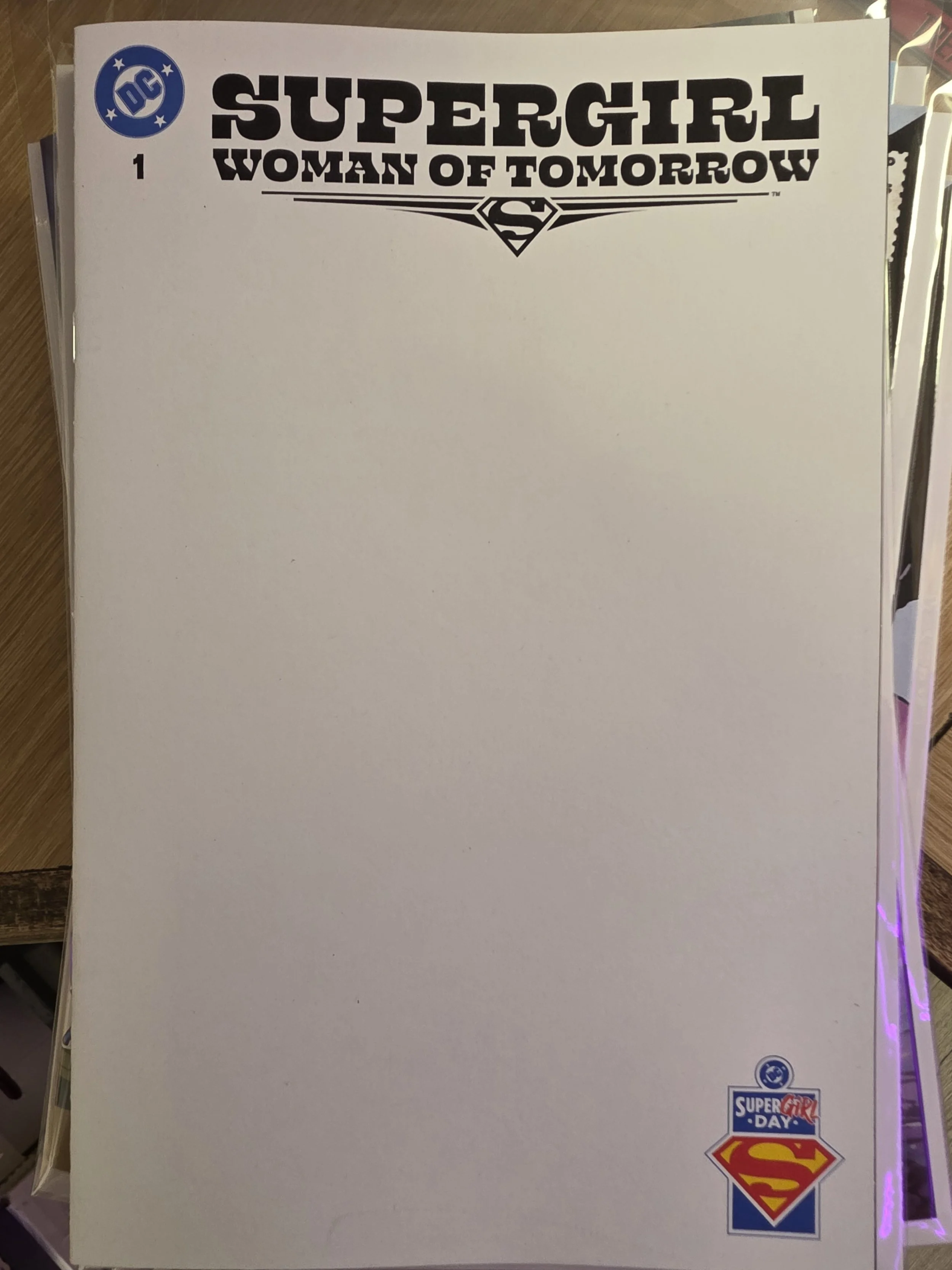 SUPERMAN DAY 2026 - SUPERGIRL WOMAN OF TOMORROW #1 CVR C BLANK CARD STOCK VAR