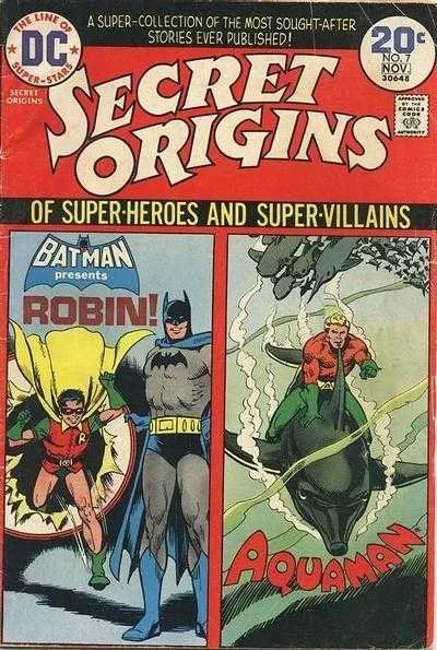 Cover of Secret Origins #7 (1974, DC Comics) featuring multiple DC characters in classic Bronze Age artwork with bold colors and dynamic panel imagery.