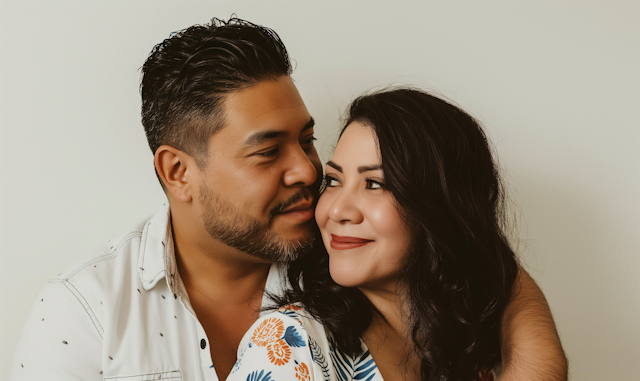 Couple smiling closely at each other with warmth and connection, representing safety and support during emotional flashbacks.