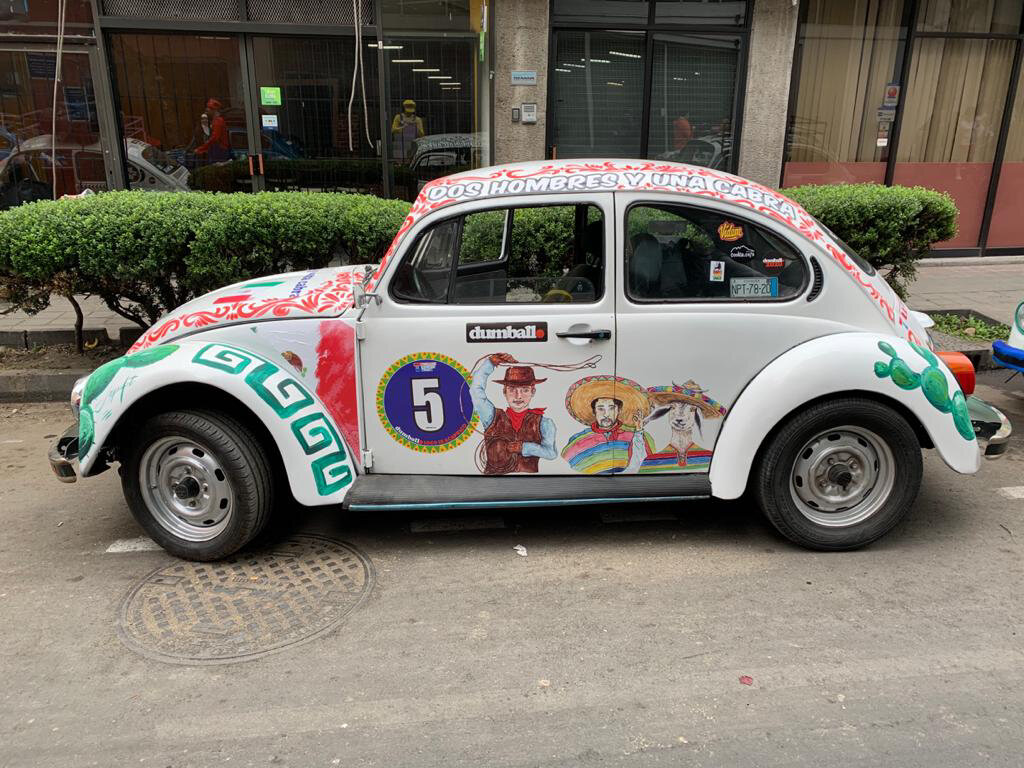 Cartoon decals for a Charity Dumball Rally Car