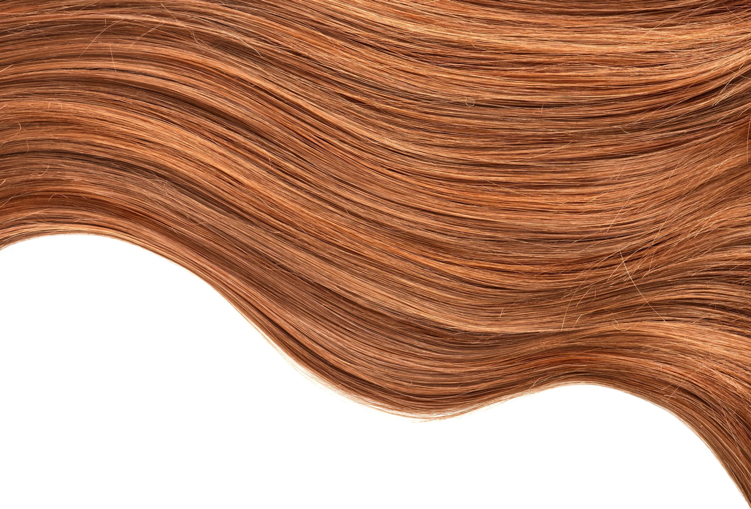 Close-up of straight, shiny, auburn hair.