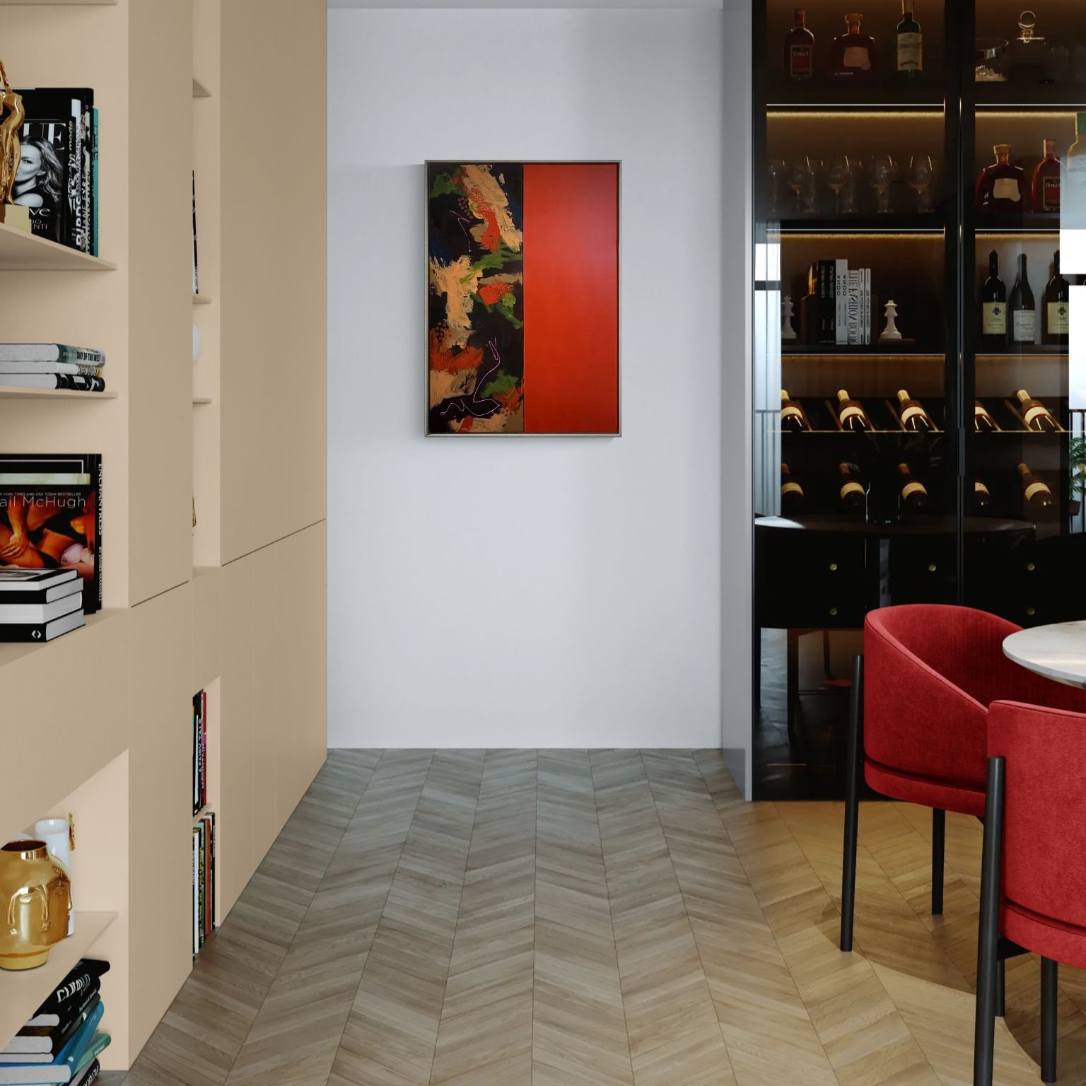 Modern interior with a bookshelf filled with books and decor, a white wall with abstract art, a wine storage cabinet with bottles, and red chairs around a table.