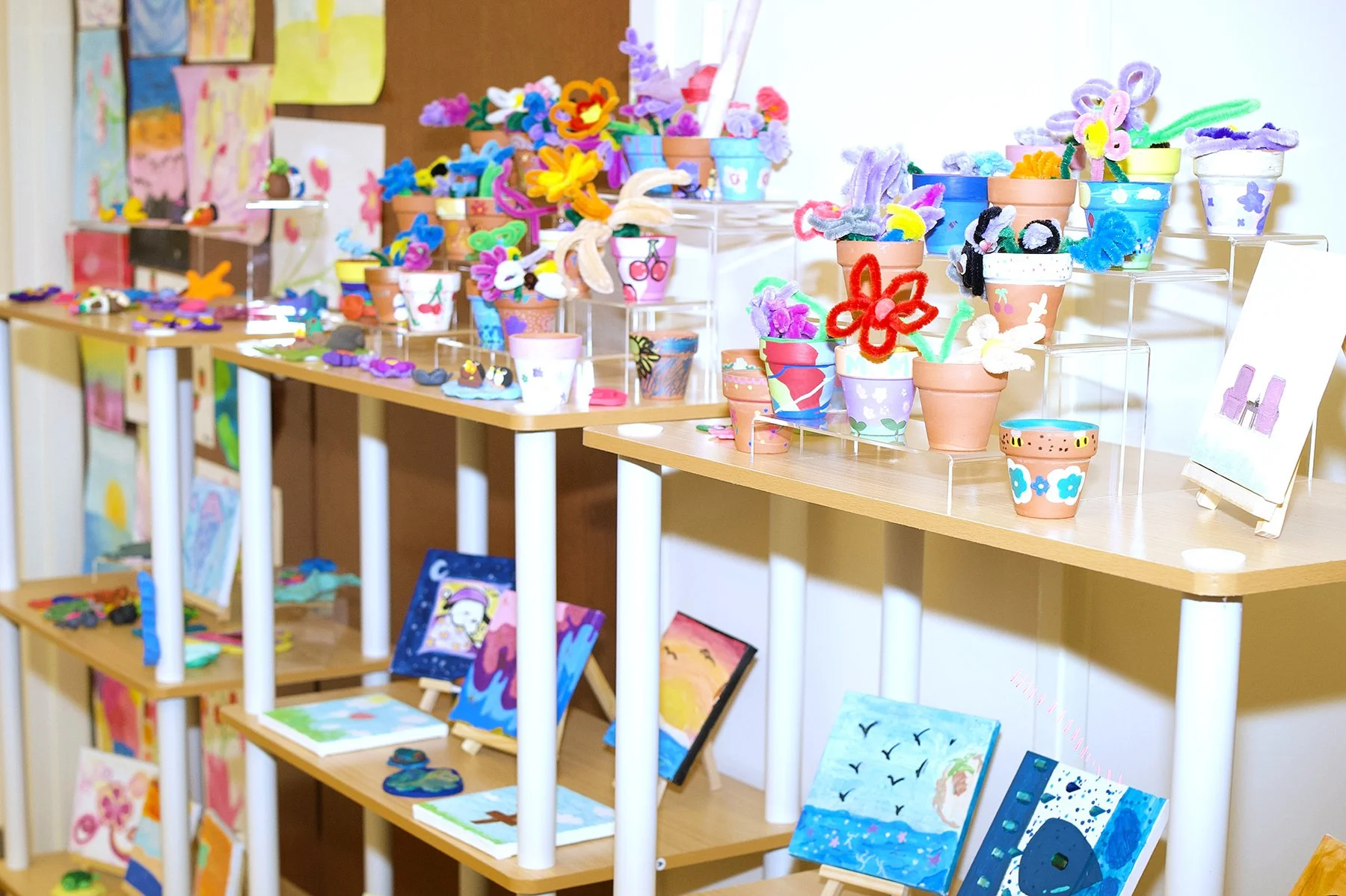 Shelves containing handmade arts and crafts