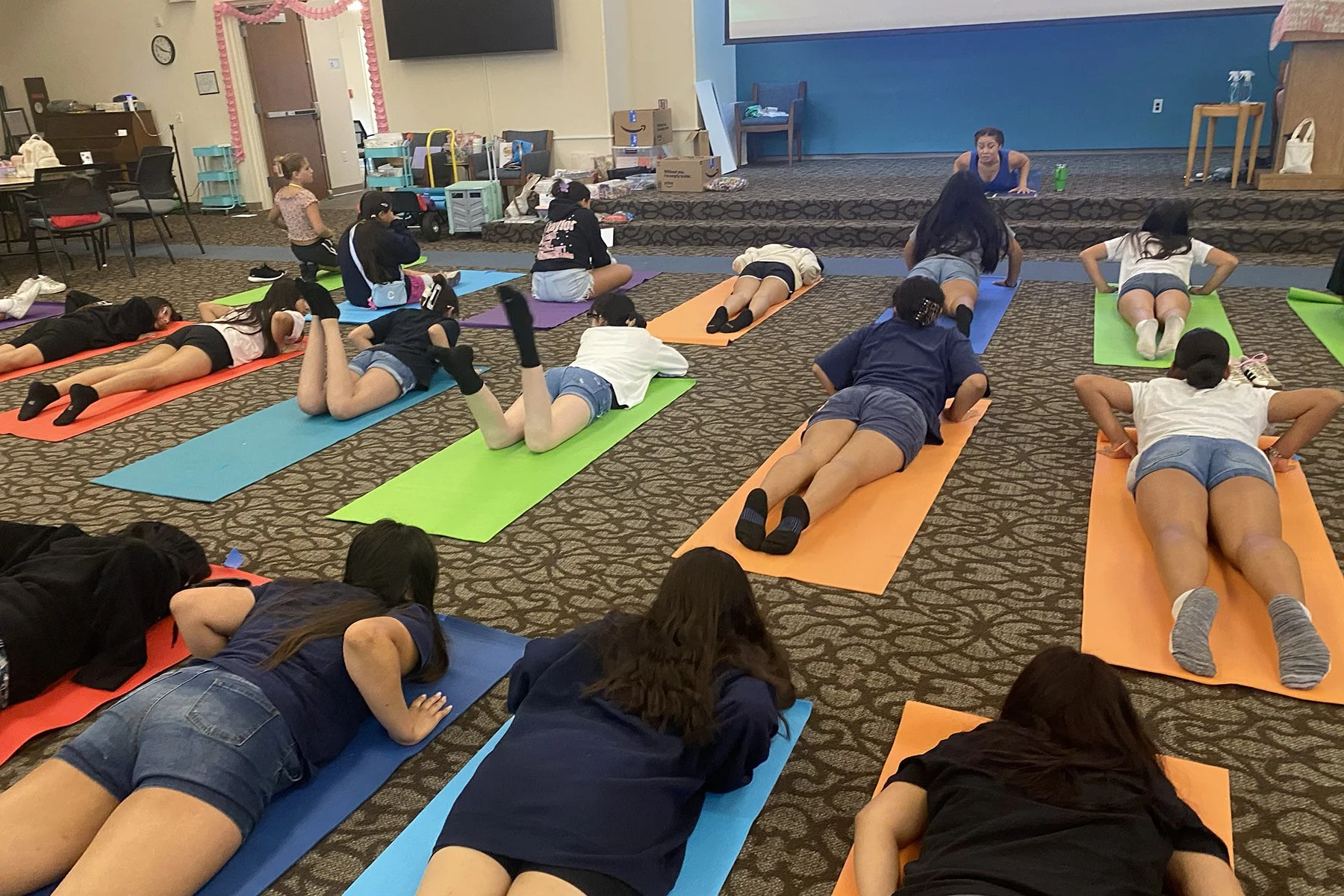 Group of Latina girls doing yoga